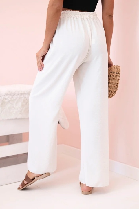 Spodnie z szeroką nogawką jasno beżowe