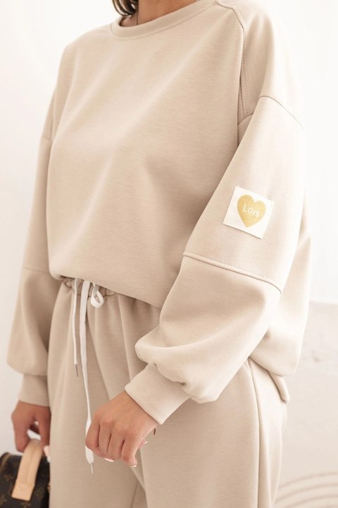 Komplet masełkowy z luźną bluzą i spodniami z napisem LOVE beżowy