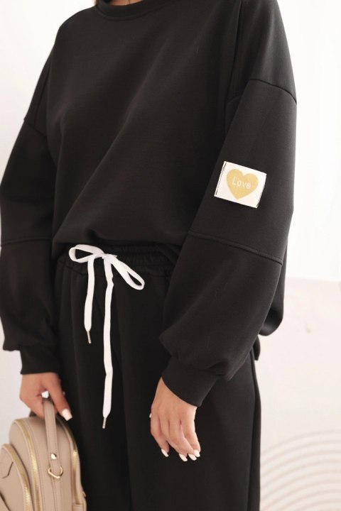 Komplet masełkowy z luźną bluzą i spodniami z napisem LOVE czarny